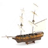 A wooden model of a warship The Galleon Blue Shadow, with realistic decking and masts, set with