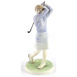 A Wedgwood porcelain figure, Lady Golfer, T30, 22cm high.