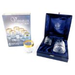 A boxed Versaille Collection tumbler set, with gilt banding and shaped dragooned bases, 9cm high, (