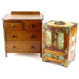 An oak miniature chest of drawers, and a modern oriental hardwood and green stone jewellery box. (