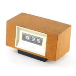 A Japanese Computim desk timepiece, with battery movement and teak case, 20cm wide.