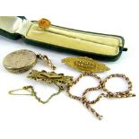 A small group of Victorian and later jewellery, comprising a 9ct gold filigree design bar brooch,