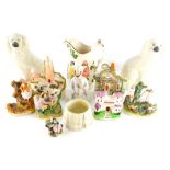 Various Staffordshire pottery, to include a pair of Staffordshire spaniels, figure group possibly