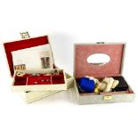 Two faux leather jewellery boxes and contents, to include silver and other dress rings,