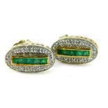 A pair of emerald and diamond earrings, each set with five square cut emeralds, surrounded by