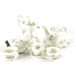 A Royal Albert Haworth pattern part tea service, to include small tea pot and cover, water jug and