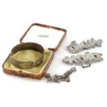 A small quantity of silver jewellery, comprising a Chinese writing and florally engraved belt