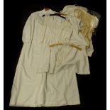 Various items of vintage clothing, to include children's dresses, ladies linen high necked