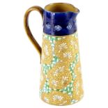 A Royal Doulton Slater's patent jug, with a blue band above a band of flowers, in turquoise and