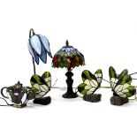 A collection of Tiffany style light fittings, to include a small lamp base with stained glass shade,