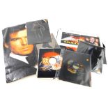 A collection of James Bond relating ephemera and display material, to include a poster of the film