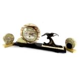 A French black slate and marble art deco mantle timepiece, the circular dial with Arabic numerals,