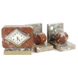 A French marble mantel clock, with lozenge shaped dial, the case in brown, cream and beige