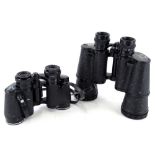 A pair of Zenith 10/50 binoculars, and a pair of Tasco zip 8/30mm binoculars, both lacking cases.
