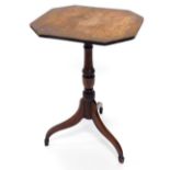 An early 19thC mahogany occasional table, the canted rectangular top on a turned column and
