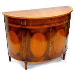 *A mahogany and satinwood demi lune side cabinet, the tulipwood and satinwood crossbanded top