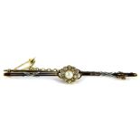 A Victorian bar brooch, set with central cultured pearl, surrounded by tiny old cut diamonds,