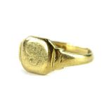 A 9ct gold signet ring, with octagonal shield, bearing rubbed initials, with etched shoulders,