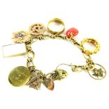 A 9ct gold charm bracelet and ten charms, the modern twist and cross design bracelet, with ten