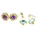 Two 9ct gold earrings, comprising a pair of amethyst floral cluster earrings, with butterfly