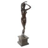 Tom Merrifield (b1932) A nude figure of a nude female dancer, on a square plinth decorated with