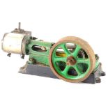 A small scratch built static engine, part painted in green, signs of rust and does not run freely,