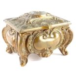 A 20thC metal Rococo design musical jewellery box, of small proportion on shaped feet 10cm wide.