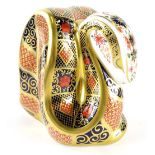 A Royal Crown Derby Imari pattern snake paperweight ornament, gilt stopper, printed marks beneath,