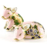 A Royal Crown Derby Sinclairs Plumstead piglet paperweight ornament, silver stopper, printed marks