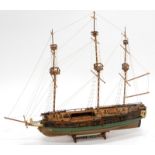 A 20thC model of the ship The Galleon La Gloire, with realistic decking and masts on a wooden stand,