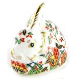 A Royal Crown Derby meadow rabbit paperweight ornament, gilt stopper, printed marks beneath, 6cm