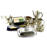 A quantity of silver plate, to include a three piece Elkington and Co tea set, an egg cruet,