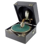 A vintage black canvas Decca portable gramophone, with chrome plated mounts, 30cm wide. (AF)