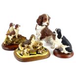 A collection of dog figures, to include Border Fine Arts Spaniel and two puppies signed Ayres,