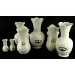 A collection of Donegal Belleek Connemara Cladd vases, various sizes, (7).