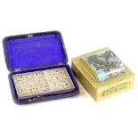 A highly elaborate early 20thC white metal filigree card case, of rectangular form set with