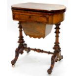 A Victorian burr walnut games/ work table, the hinged shaped top with a moulded edge, enclosing a