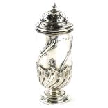An Edwardian silver castor, with domed top and cone shaped partially gadrooned body, raised with