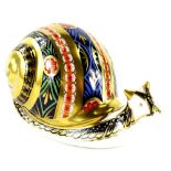 A Royal Crown Derby garden snail paperweight ornament, limited edition 1417/4500, gilt stopper,