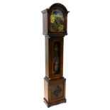 A late 20thC/early 21stC oak cased longcase clock, the brass arch dial stamped Comitti, with