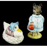 Two Beswick Beatrix Potter figures, Jemima Puddleduck, Made a Feather Nest and Pig-Wig, both brown