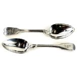 A pair of George III silver fiddle and thread pattern table spoons, engraved with a deer crest, by
