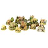 A collection of Lilliput Lane cottages, to include Enchanted Garden, bearing signature, Made for the