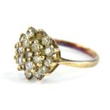 A 9ct gold cluster ring, set with two layers of CZ stones, each in claw setting (AF, one stone