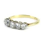 A five stone diamond ring, set with five old cut diamonds, each in claw setting, approx 0.45cts