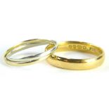 Two rings, comprising a 22ct gold wedding band, of plain design, 5.3g, and a two linked dress
