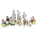 Various continental porcelain figures, mainly children, polychrome decorated, together with child