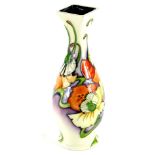 A Moorcroft pottery vase, with square section neck and rim, with tube line decoration of orange