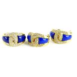 A set of lapis and diamond set jewellery, comprising ring and a pair of earrings, the ring with