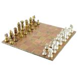 A scratch built copper, brass and aluminium chess set, the board showing some imperfections etc.